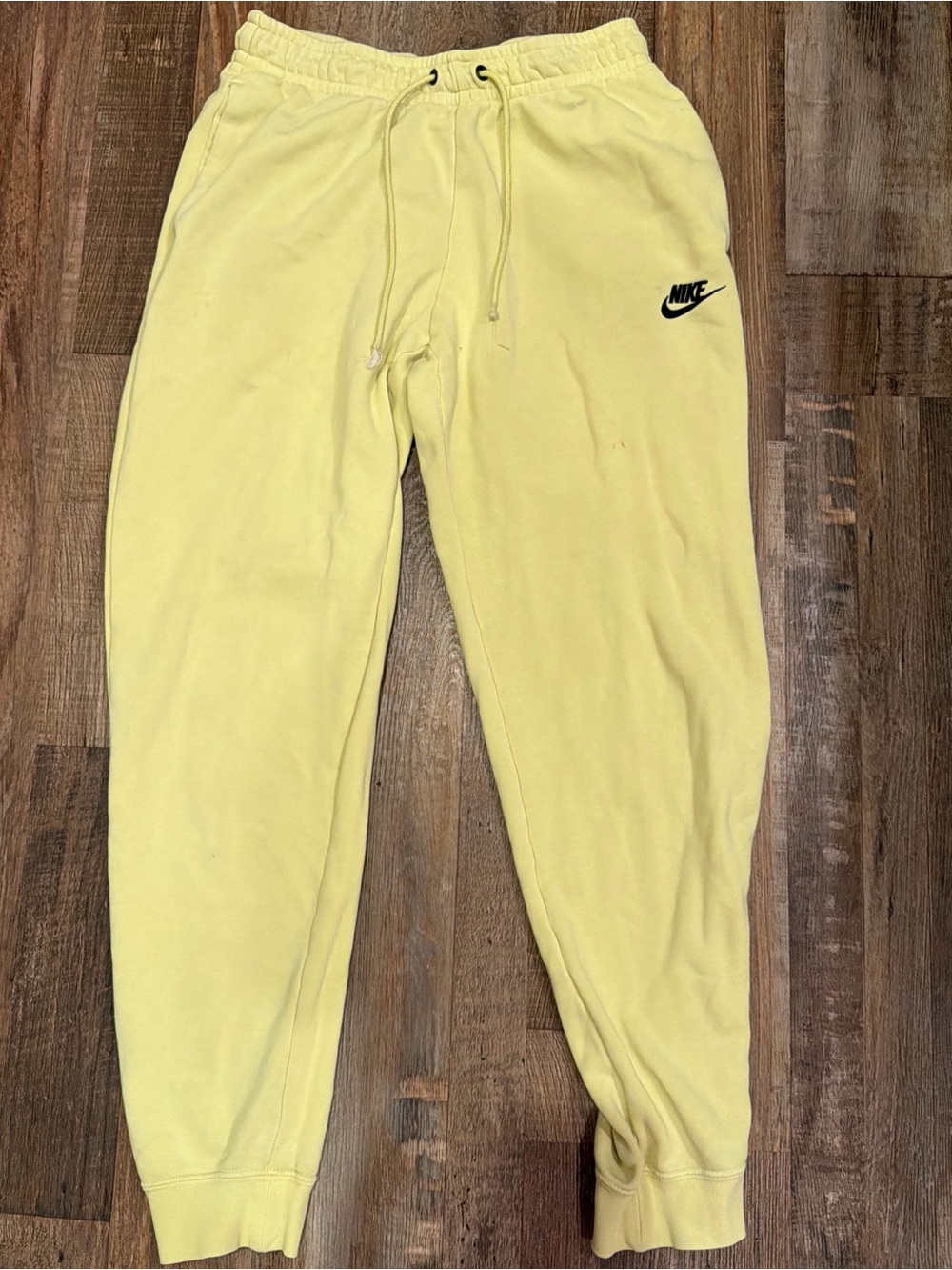 Nike Kids Yellow Drawstring Joggers with Black Swoosh